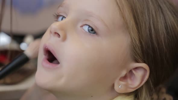 Beautiful little girl with long blonde hair