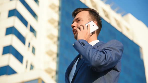 Businessman Talking On Mobile Phone