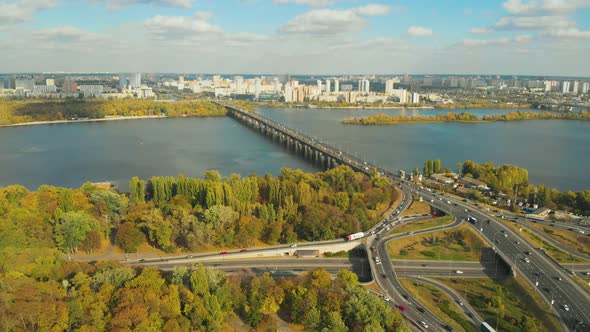 Top View Car Riding on Highway Bridge Over River