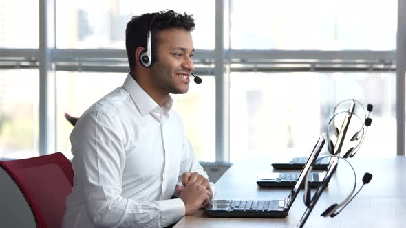 Indian Man Working in Call Center.