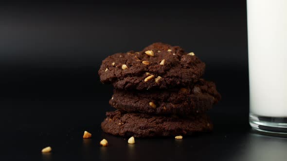 The slider of chocolate chip cookies and a glass of milk. Food biscuits close-up.