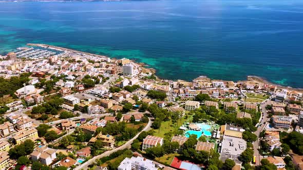 Aerial drone footage of the beach front on the Spanish island of Majorca Mallorca,