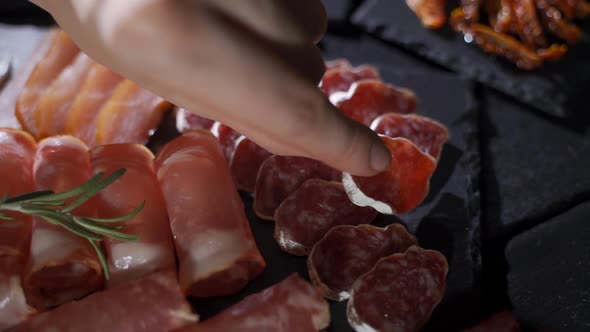 Restaurant Meat Platter (Ham, Salami, Bacon) on the Black Stone Tray