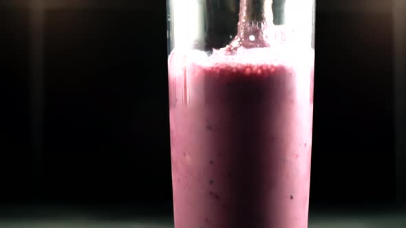 Milk Shake With Fruits In Slow Motion. Healthy Vegan Smoothie With Fruits Close Up. Smoothie Blended
