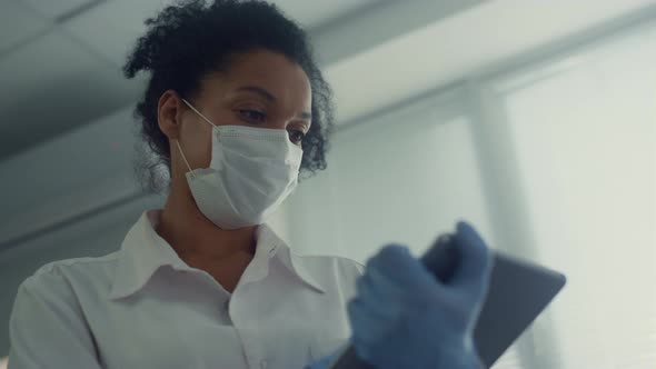 Woman Doctor Holding Tablet Talking to Patient Closeup