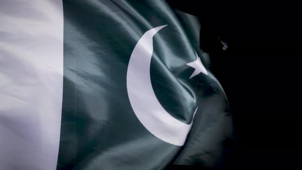 National Pakistan Flag. Black background.