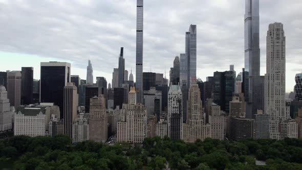 Aerial view over the Central Park, towards supertall skyscrapers in MIdtown, New York, USA - tilt, d