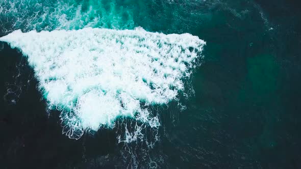 Top View of Waves and Two Surfers on the Surface of the Atlantic Ocean Off the Coast of Tenerife