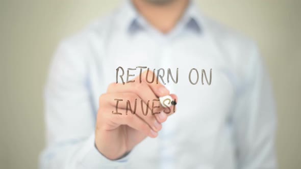 Return on Investment, Businessman Writing on Transparent Screen