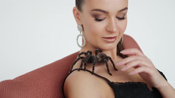 Big Black Spider on a Woman's Chest