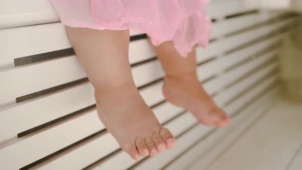 Bare Feet of a Baby Girl