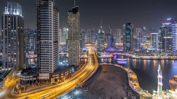 Water Canal on Dubai Marina Skyline at Night Timelapse