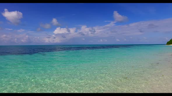 Aerial drone view texture of exotic coast beach voyage by blue water with white sandy background of 