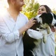 Beautiful Couple Cuddling and Walking Dogs Outdoors - VideoHive Item for Sale