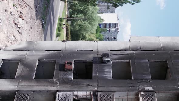 Vertical Video of the Consequences of the War in Ukraine  Burned Cars