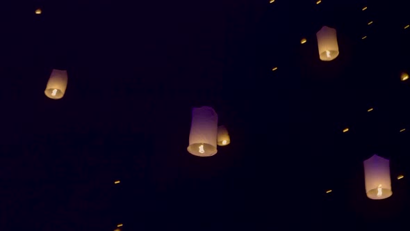 Sky Lanterns Fly Into The Night Sky