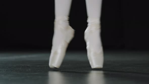 Ballerina Female Legs Closeup Dancing Jumping Standing on Tiptoes Ballet Position Practicing