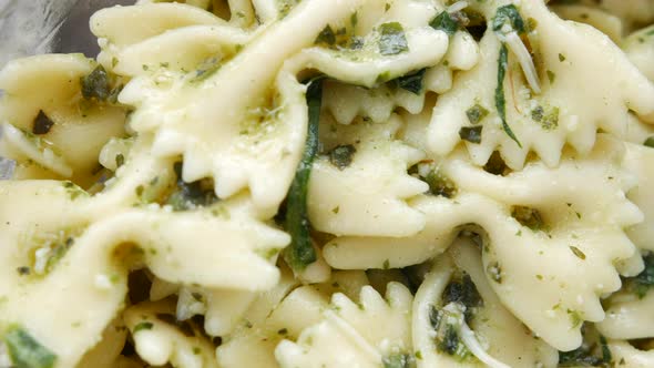 Delicious farfalle pasta with pesto and garlic dish