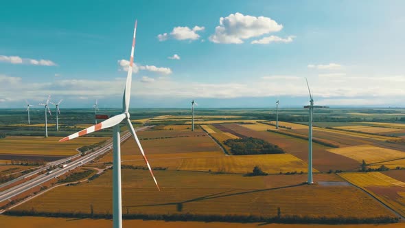 Aerial View of Wind Turbines Farm in Field. Austria. Drone View on Energy Production