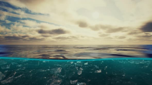 Split View Over and Under Water in the Caribbean Sea with Clouds