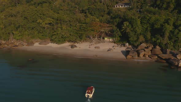 Drone video - Aerial - Speedboat arriving at the beach