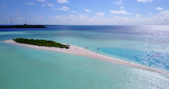 Luxury above abstract shot of a paradise sunny white sand beach and blue sea background in colorful 