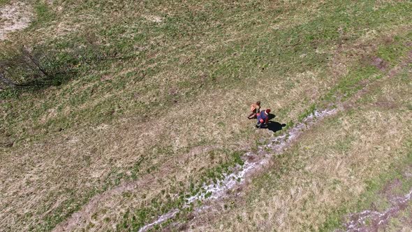 Couple Taking Stroll in Wilderness