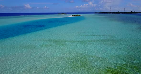 Tropical drone abstract view of a white sand paradise beach and aqua turquoise water background in v