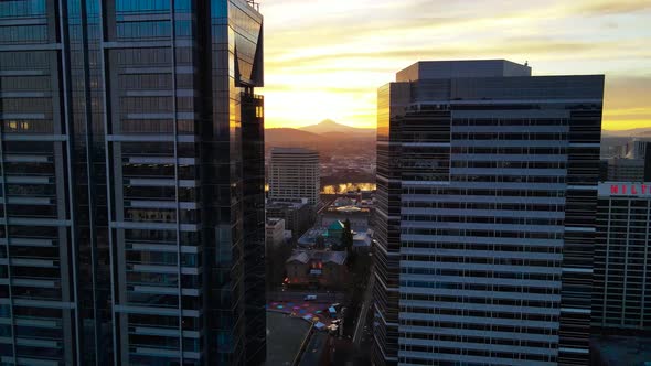 Golden Sunrise Behind Glass Building in Portland Oregon