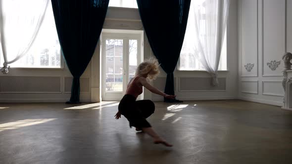 Talented Emotional Ballet Dancer Woman is Dancing Alone in Rehearsal Hall Modern Choreography