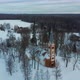Aerial Top View of the Krimulda Evangelic Lutheran Church in Winter at Sunrise Latvia 4k Video - VideoHive Item for Sale
