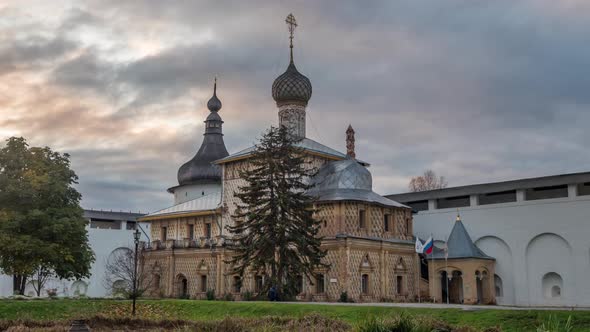 View of the Hodegetria Church in Rostov Kremlin in front of a colorful sunset