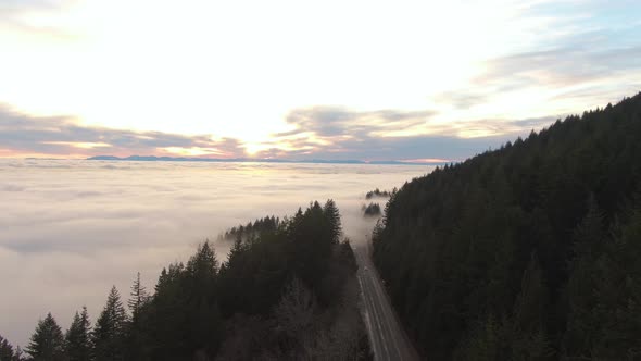 View of Canadian Nature Mountain Landscape covered in cloud and fog. West Vancouver, British Columbi