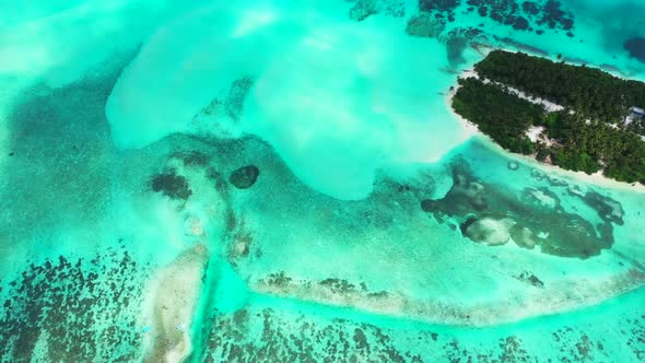 Aerial top down seascape of perfect bay beach break by blue ocean with white sandy background of a d