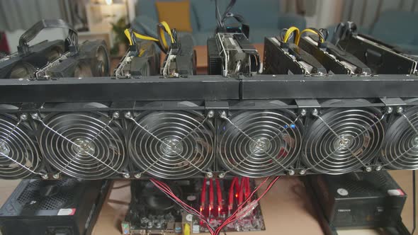 Close Up Of Cryptocurrency Mining Rig Working On The Table