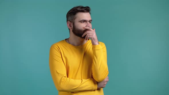 Thinking Man Looking Up on Blue Background