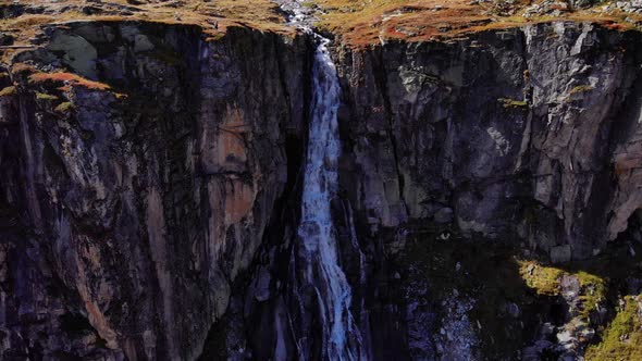 Waterfall Amidst The Rugged Canyon In Near Weisssee Lake In Austria. static shot