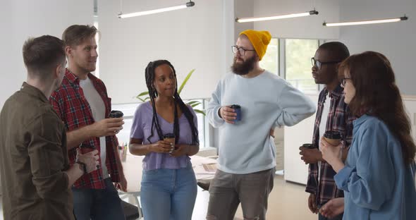 Successful Business Team Talking on Coffee Break