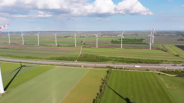 Aerial View of Wind Turbines Farm in Field. Austria. Drone View on Energy Production