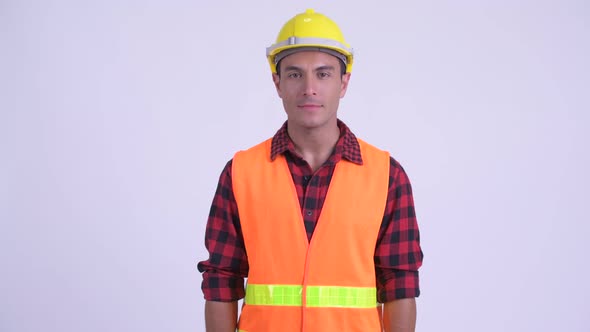 Young Happy Hispanic Man Construction Worker Smiling with Arms Crossed