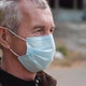 Close Up Portrait of Senior Man Wearing Protective Medical Face Mask - VideoHive Item for Sale