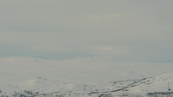 Winter Landscape At Haugastol With Weather Station Obscured By Clouds In Norway. - hyperlapse