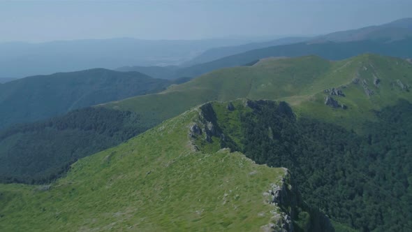 Top of The Mountain Green Grass Landscape in High Altitude Mountain