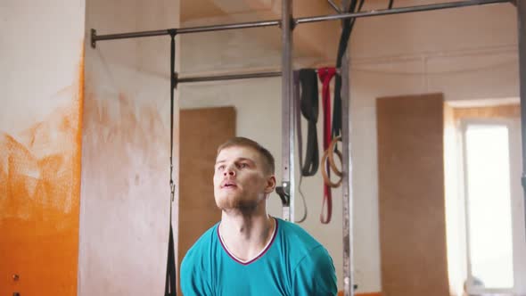 Man  Squatting with a Weight