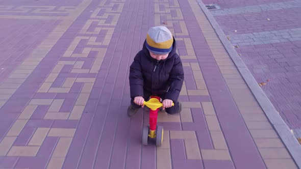 Boy Laughing On A Bike Slow Motion