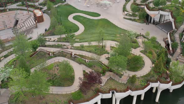 An aerial view of Manhattan's Little Island, a public space, taken early in the morning. The camera