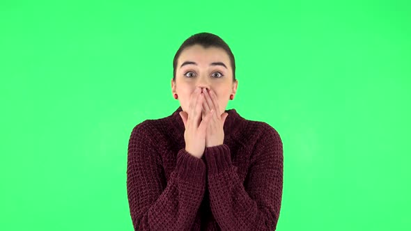 Very Surprised Girl with Shocked Wow Face Expression . Green Screen