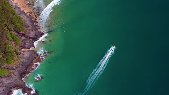 Jetskiing - Jet Skier Leaving Wake In The Blue Sea During Summer In Noosa Heads, Australia. - aerial