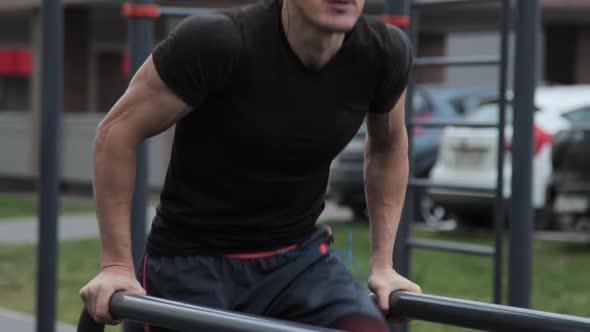 Man training outdoors on sports field