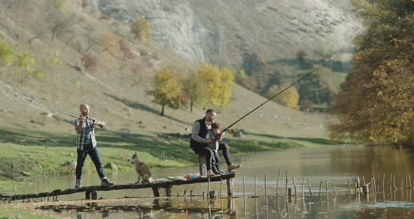 Amazing Place for Fishing Two Men and One Little